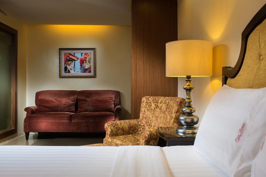 فندق مانيلافي  أجنحة توري فينيزيا الغرفة الصورة